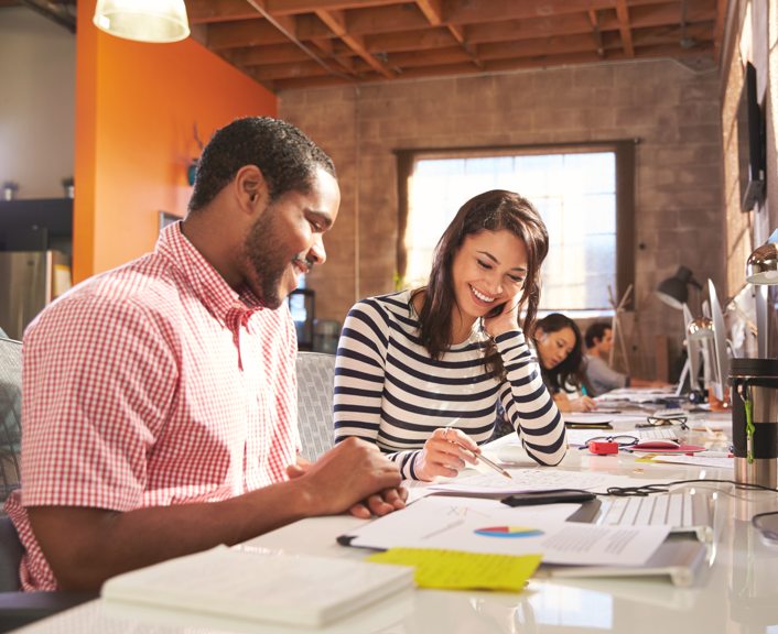 two people working together on a project